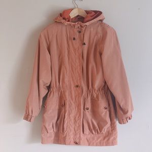 Blush colored wind breaker